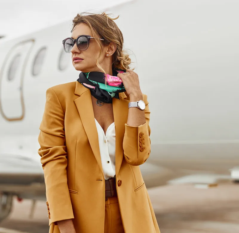 Woman in front of plane - Flights